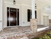 Brick Front Porch in the Ashford plan built by Waterford Homes